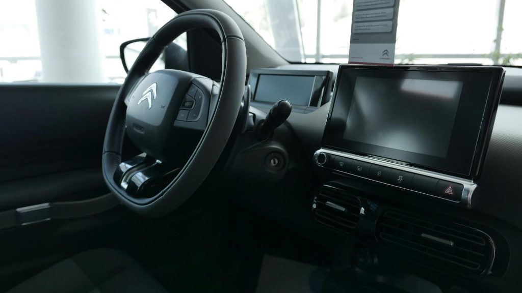 View of a Car Dashboard and Steering Wheel